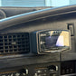 Car dashboard with a Defi racing computer display